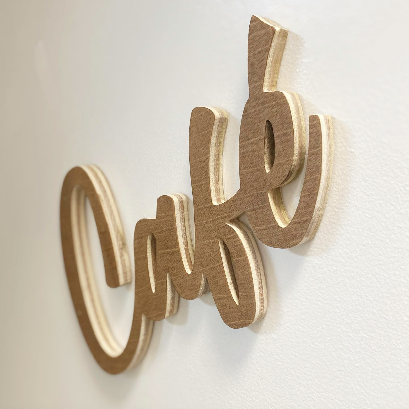 Hand-shaped wooden letters